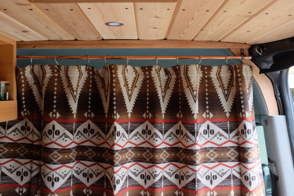 dividing curtain in cabin of so we bought a van